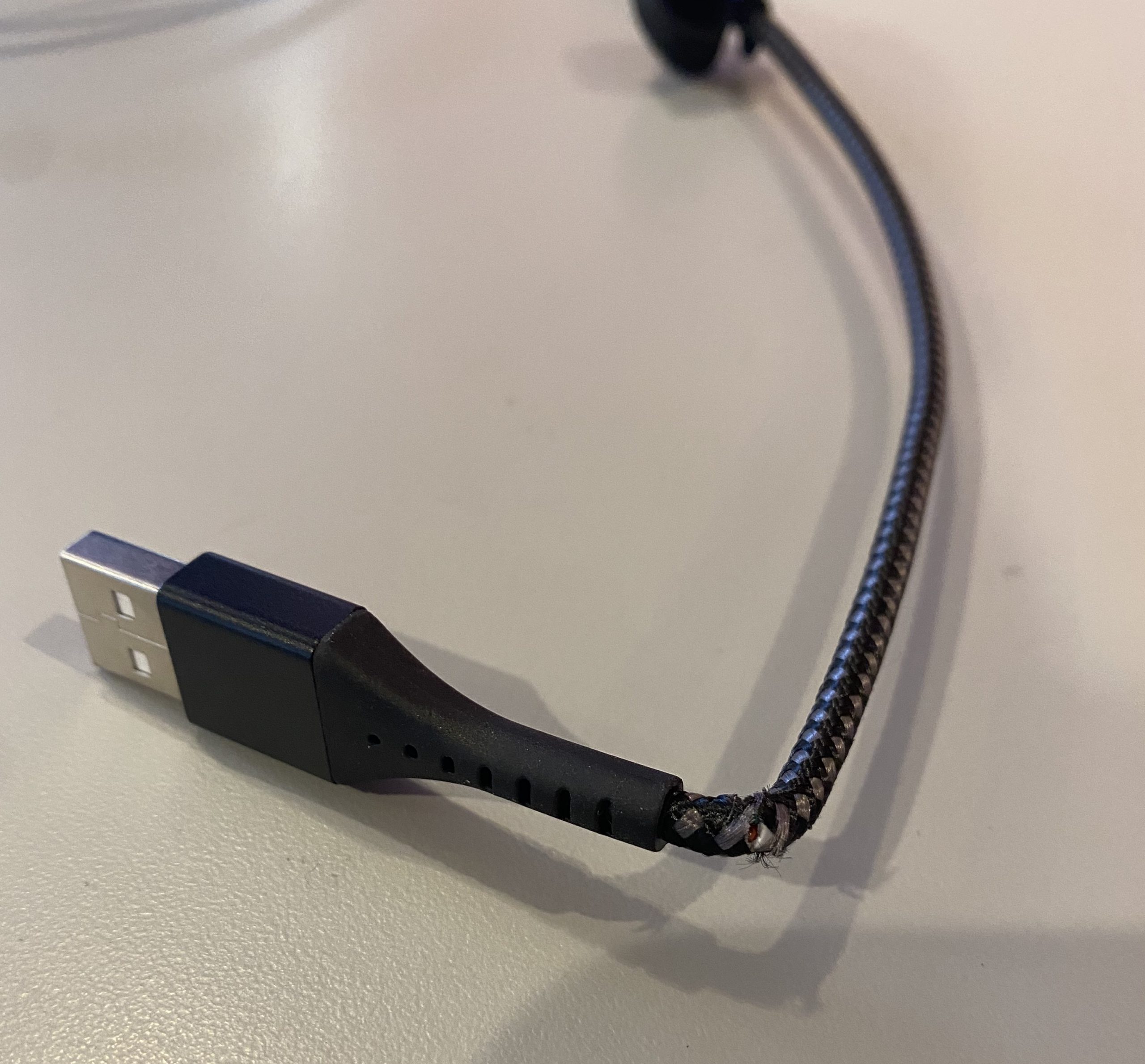 Damaged charging cable example 2